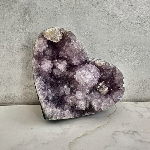 Hand-carved heart of violet amethyst