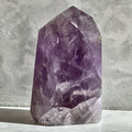 Polished tower of violet amethyst