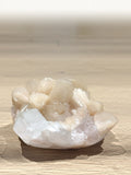 Peach stilbite crystals in a rim of clear apophyllite