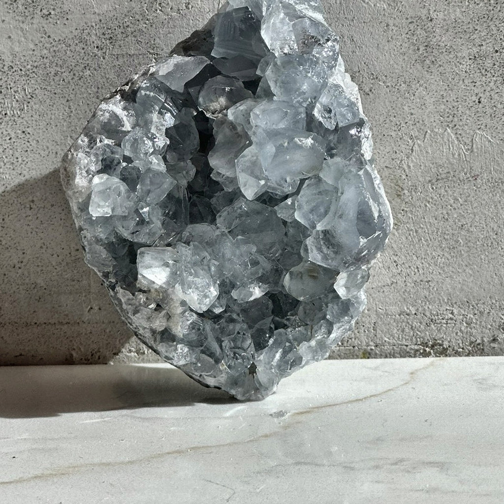 Natural cluster of pale blue celestite points