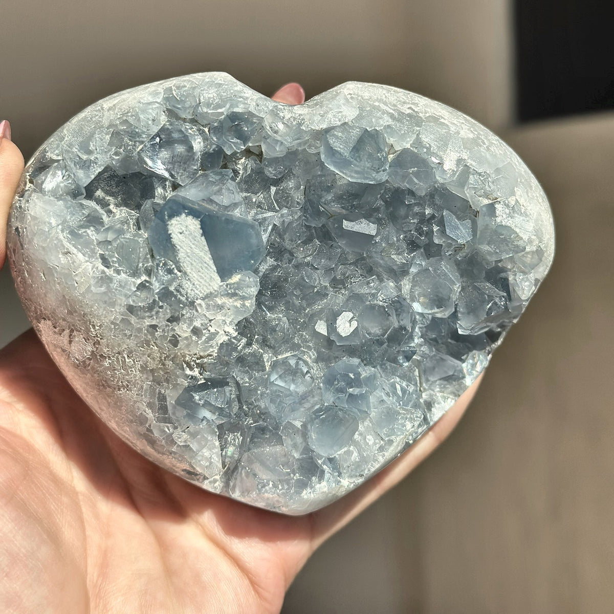 Large hand-carved heart of pale blue celestite