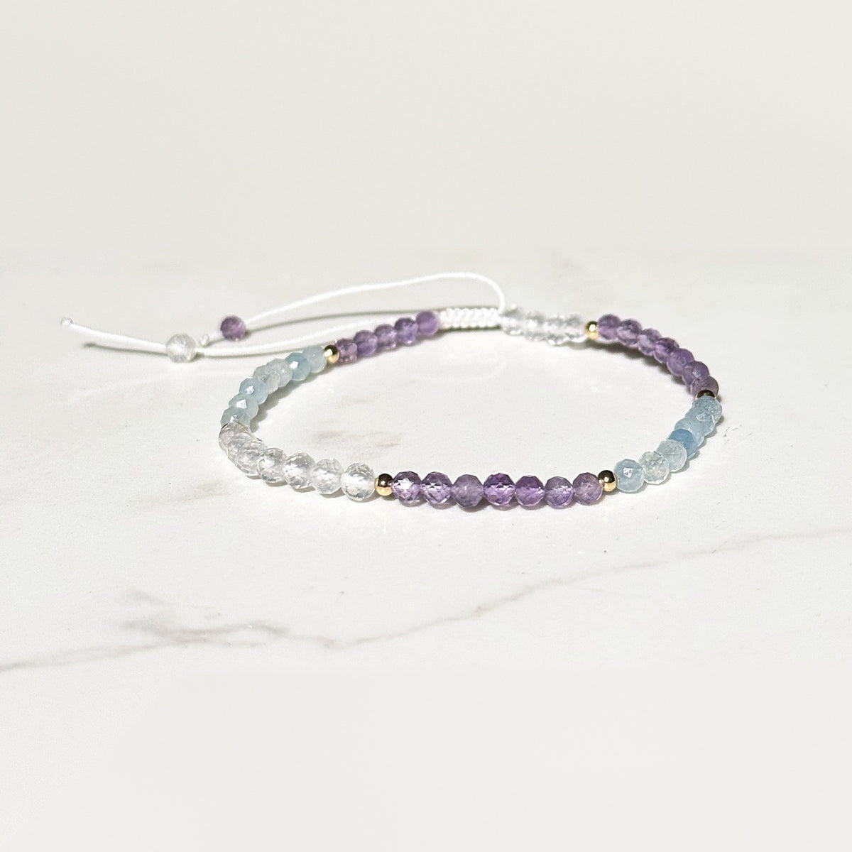 Clarity adjustable bracelet in amethyst, aquamarine and clear quartz