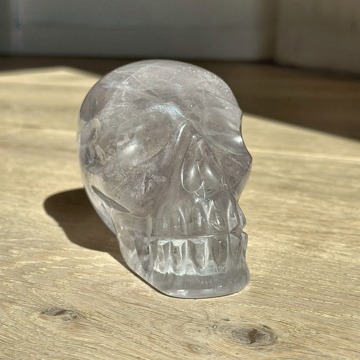 Hand-carved skull of clear quartz