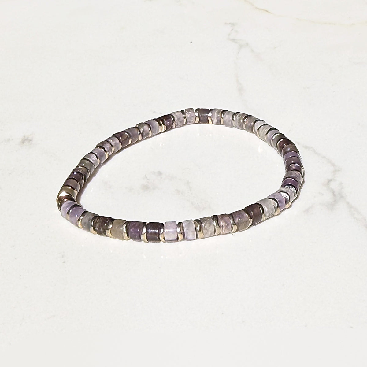 Empower stretch bracelet in golden hematite and amethyst
