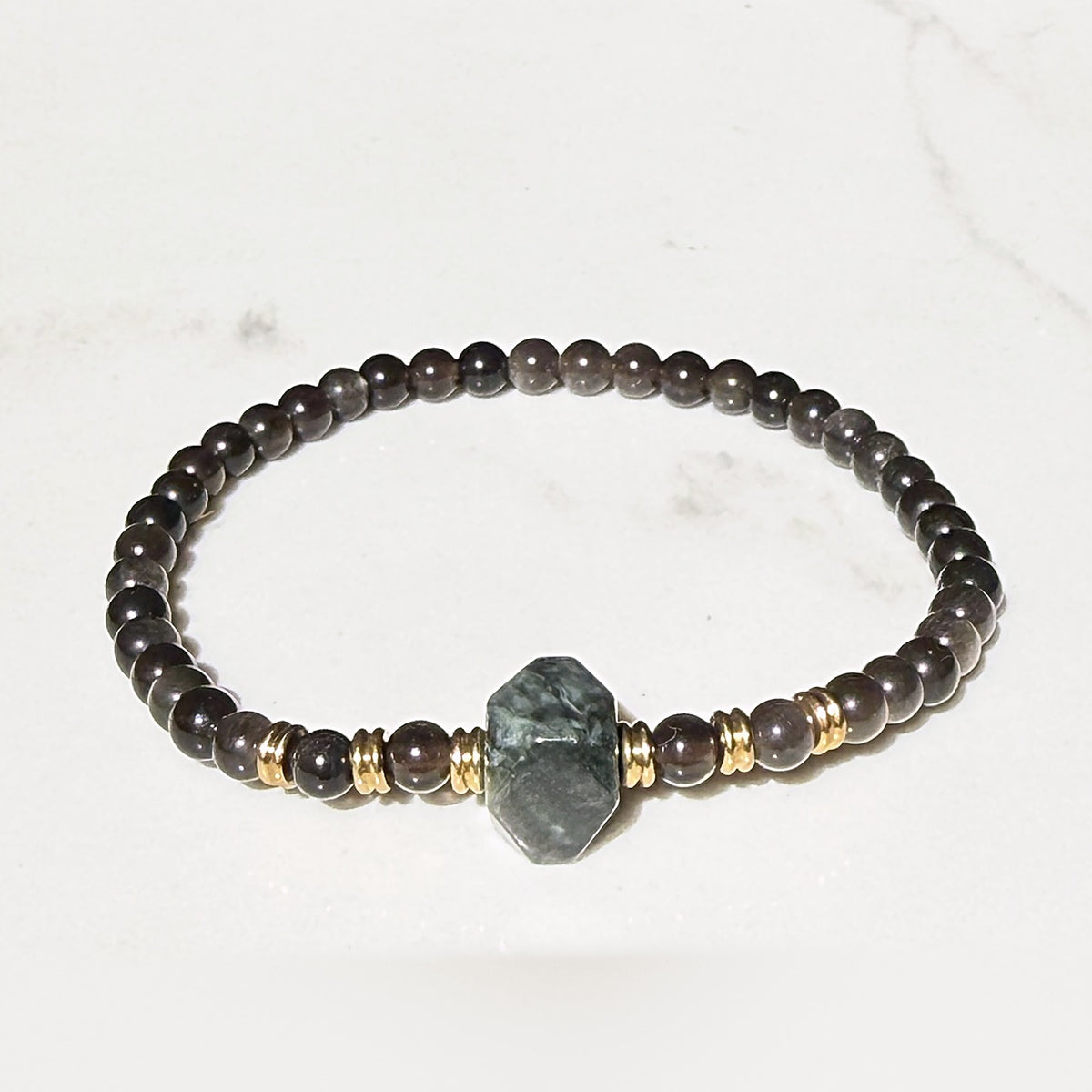 Guardian stretch bracelet in obsidian and hawk’s eye