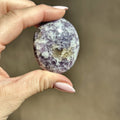 Smooth meditation stone of lavender lepidolite