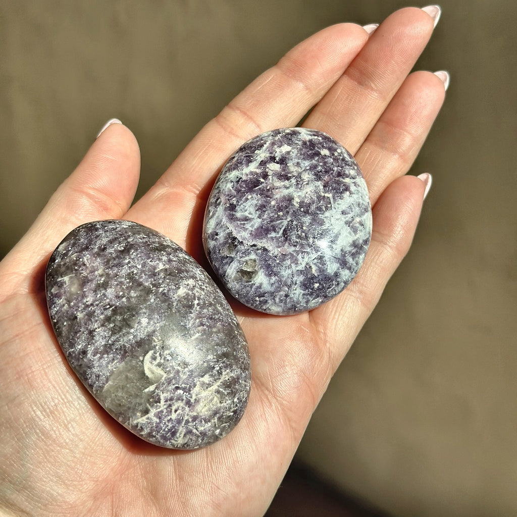 Smooth meditation stone of lavender lepidolite, second view