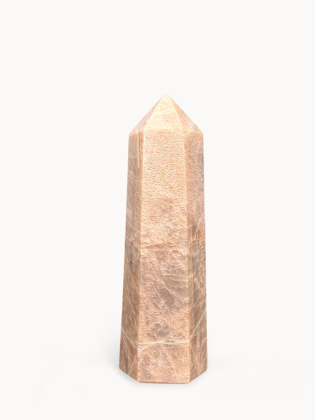 Polished peach moonstone tower, 7 inches tall, even rosy peach