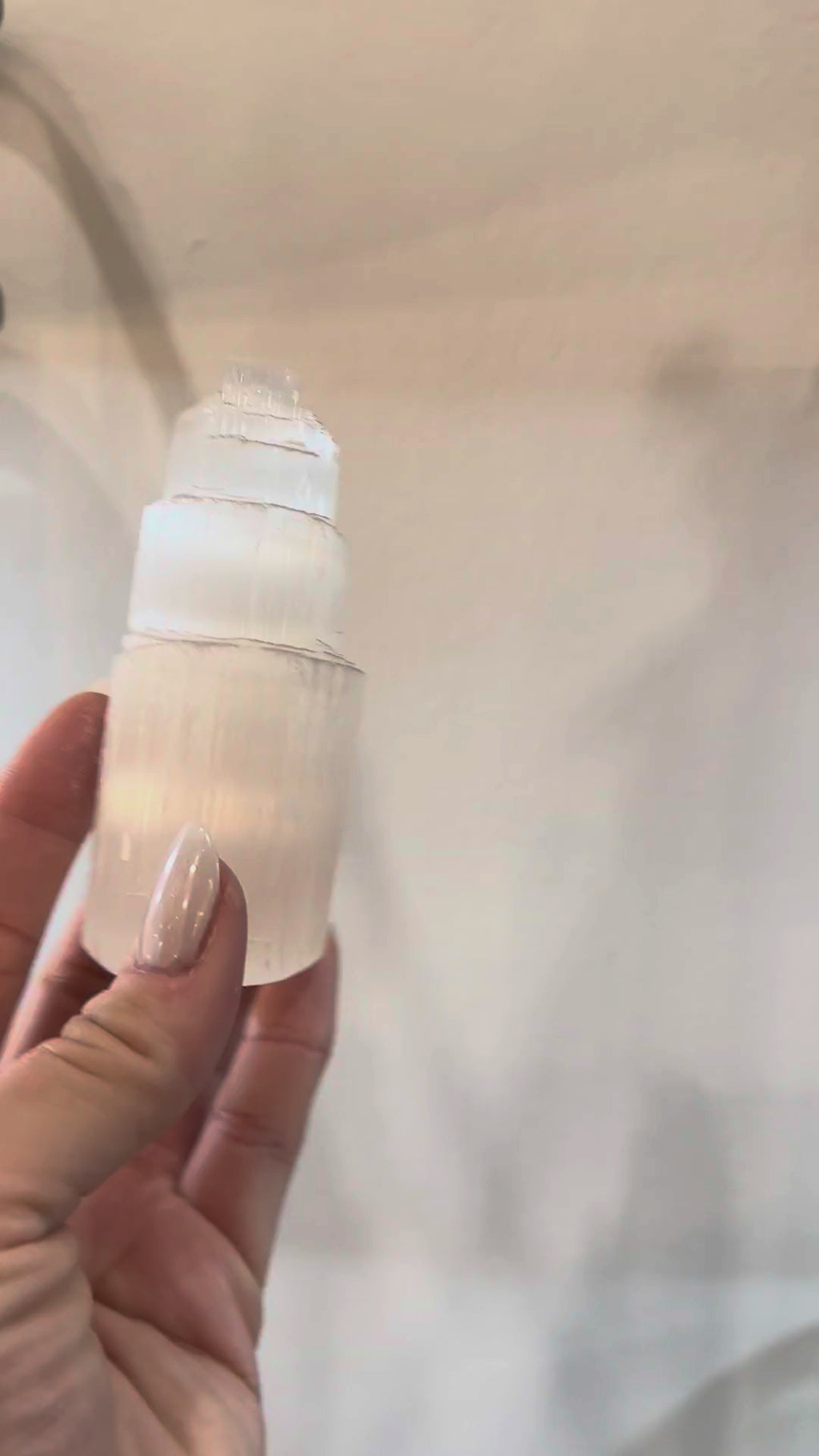 Selenite tower glowing in soft light