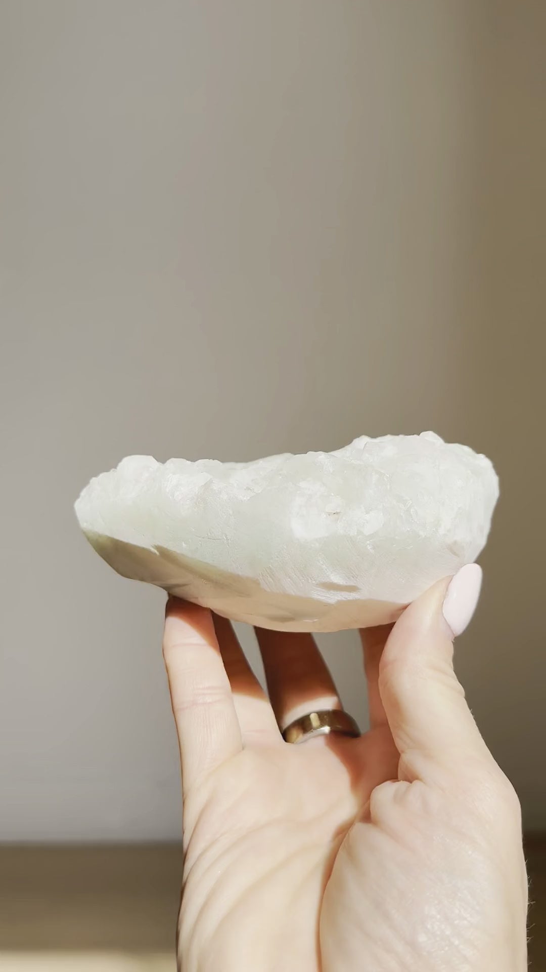 The snow-white apophyllite cluster catching the light