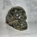 Hand-carved skull of golden pyrite from Peru
