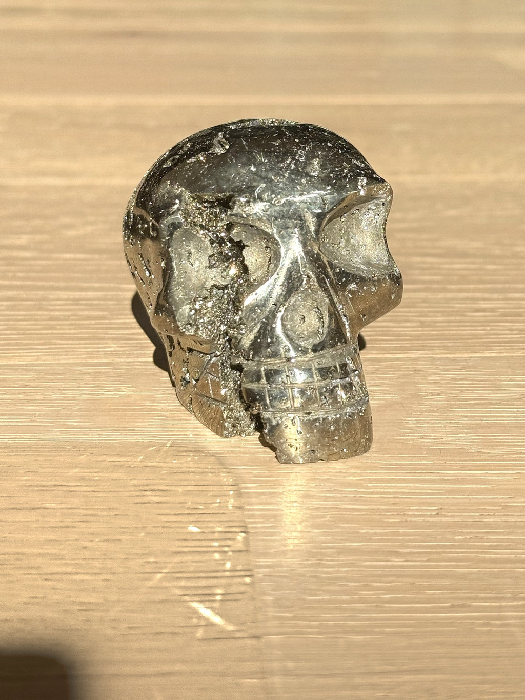 Pyrite skull No. 5, front view showing the seam