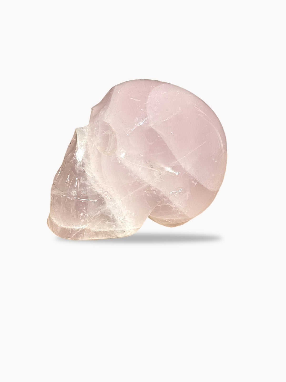 Large rose quartz skull, side profile