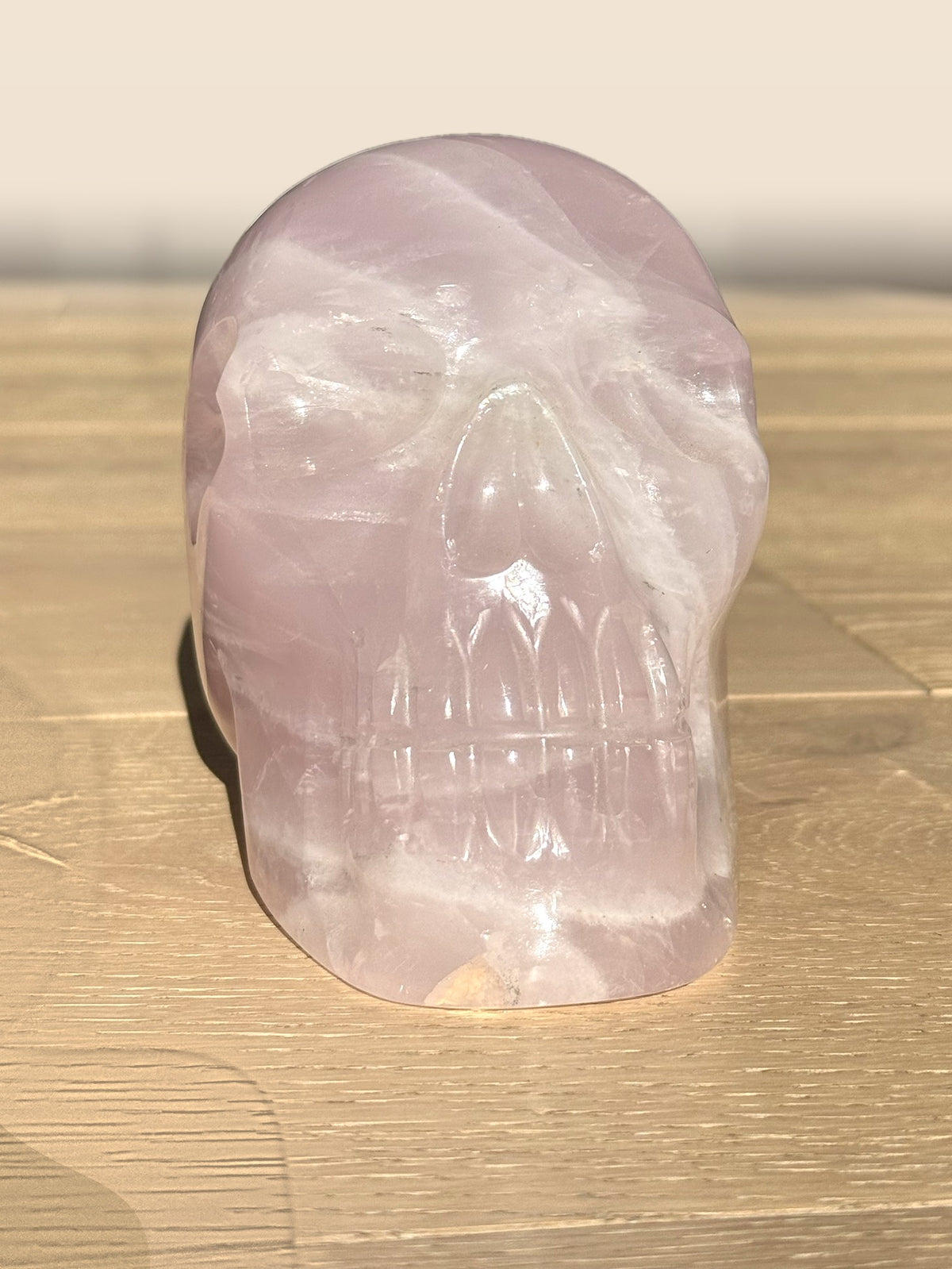 Large rose quartz skull, front view