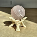 Large polished sphere of soft pink rose quartz from Madagascar