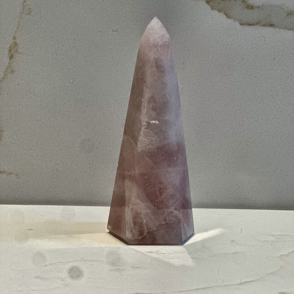 Polished tower of soft pink rose quartz from Madagascar, second view