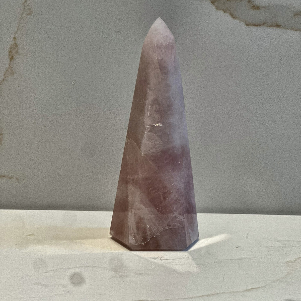 Polished tower of soft pink rose quartz from Madagascar, second view