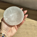 Carved bowl of pearly white selenite