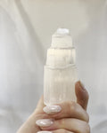 Selenite tower held up to the light