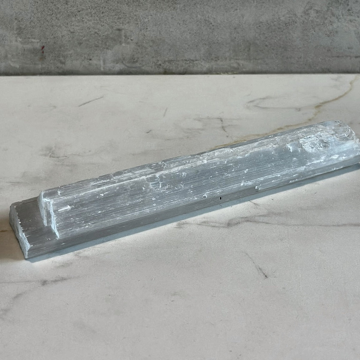 Small wand of pearly white selenite