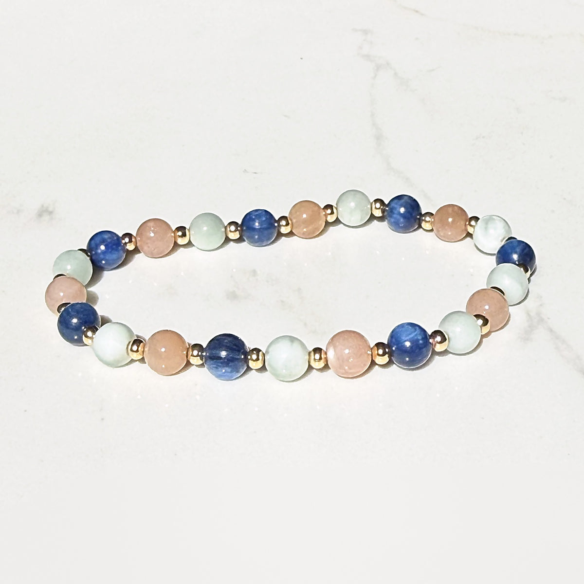 Serenity stretch bracelet in kyanite, peach moonstone and angelite