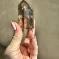 Polished tower of smoky quartz